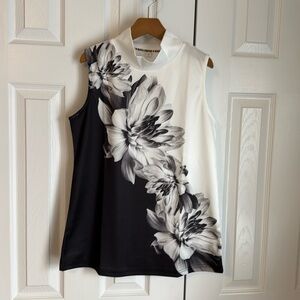 Women’s sleeveless top in size small. Like new.